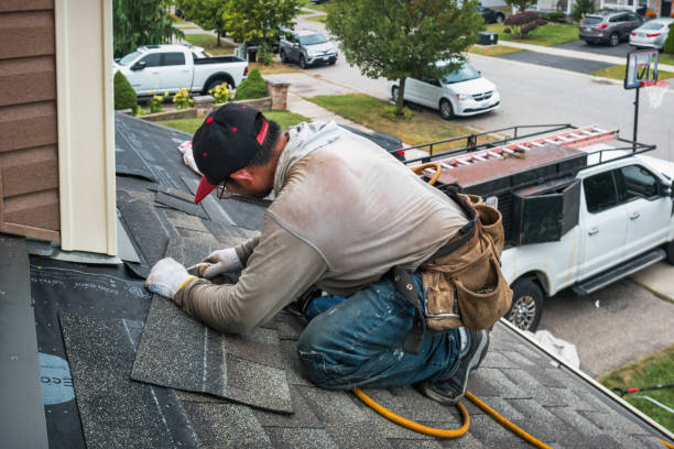 Professional Roofing technician working in Morris, NY